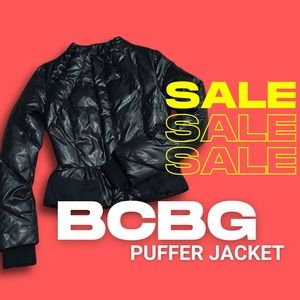 Stay Warm & In Style BCBG Black Puffer Perfect blend of fashion & function!